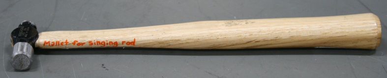 A small-headed ball peen hammer is marked "Mallet for singing rod" on the handle.