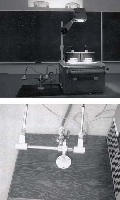 Top: Full setup showing the vortex tube on the lecture bench with two projection thermometers displayed on an overhead projector. Bottom: Close-up of the vortex tube mounted on a base plate with thermometer probes inserted into both outlet ends on rod stands.