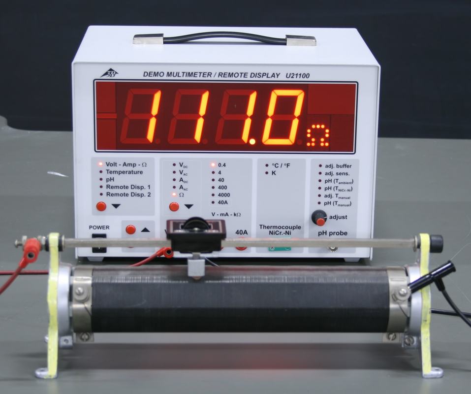 Demo multimeter reading 111.0 Ω with the rheostat slider near the middle of the coil