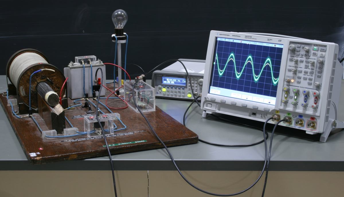 LRC setup with oscilloscope showing two nearly in-phase sinusoidal traces, indicating near-resonance condition