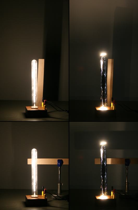 Four-panel image: (top left) tall clear filament bulb with bar held vertically casting a shadow, (top right) same bulb wrapped in aluminum foil with bar vertical, (bottom left) bar held horizontally with unwrapped bulb, (bottom right) foil-wrapped bulb with bar horizontal showing sharp shadow from pinhole