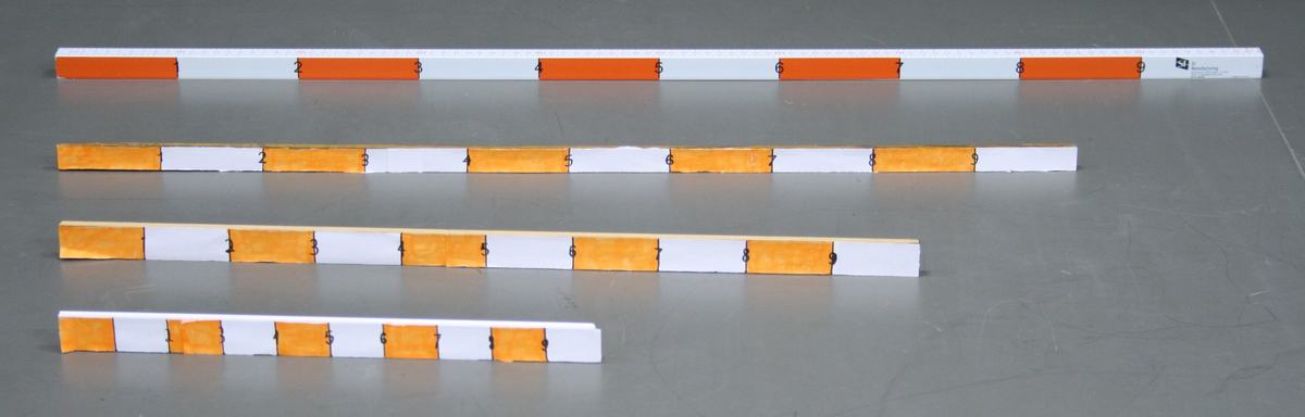 Four white sticks with alternating orange segments and number markings, arranged horizontally with left edges aligned; top stick is a full meter, each subsequent stick is progressively shorter